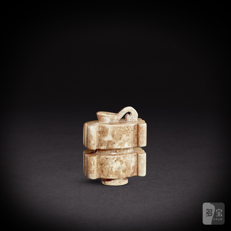 A white jade 'sinan' pendant, Han dynasty | 漢 白玉司南形珮